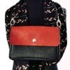 sac à rabat interchangeable amovible en cuir noir et rouge